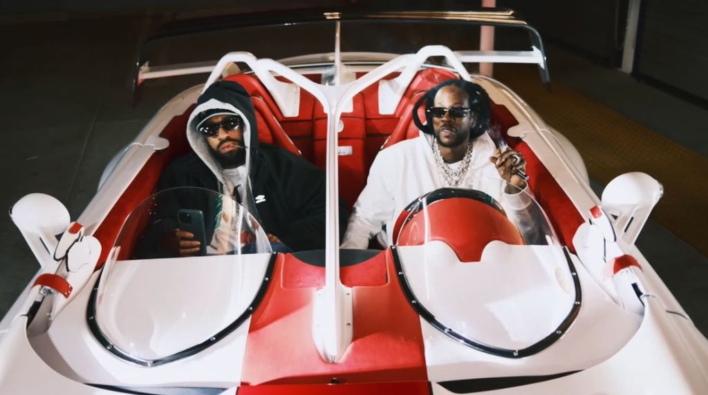 Larry June and 2 Chainz in luxury car for 'Bad Choices' music video