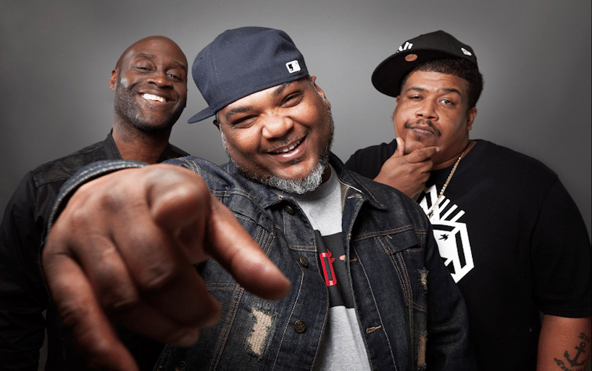 De La Soul laughing together in a promotional photo for their new album.