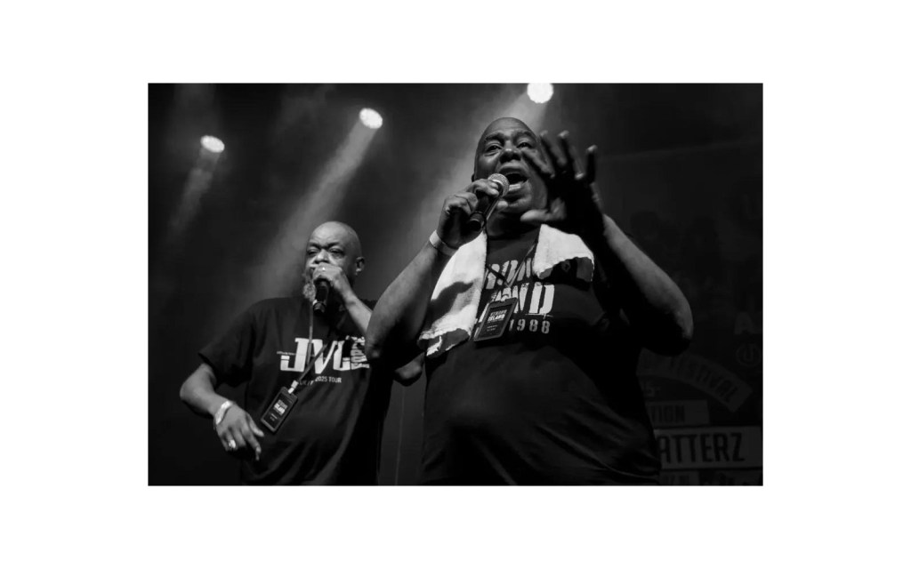 Rap duo JVC Force performing together on stage during their tour.
