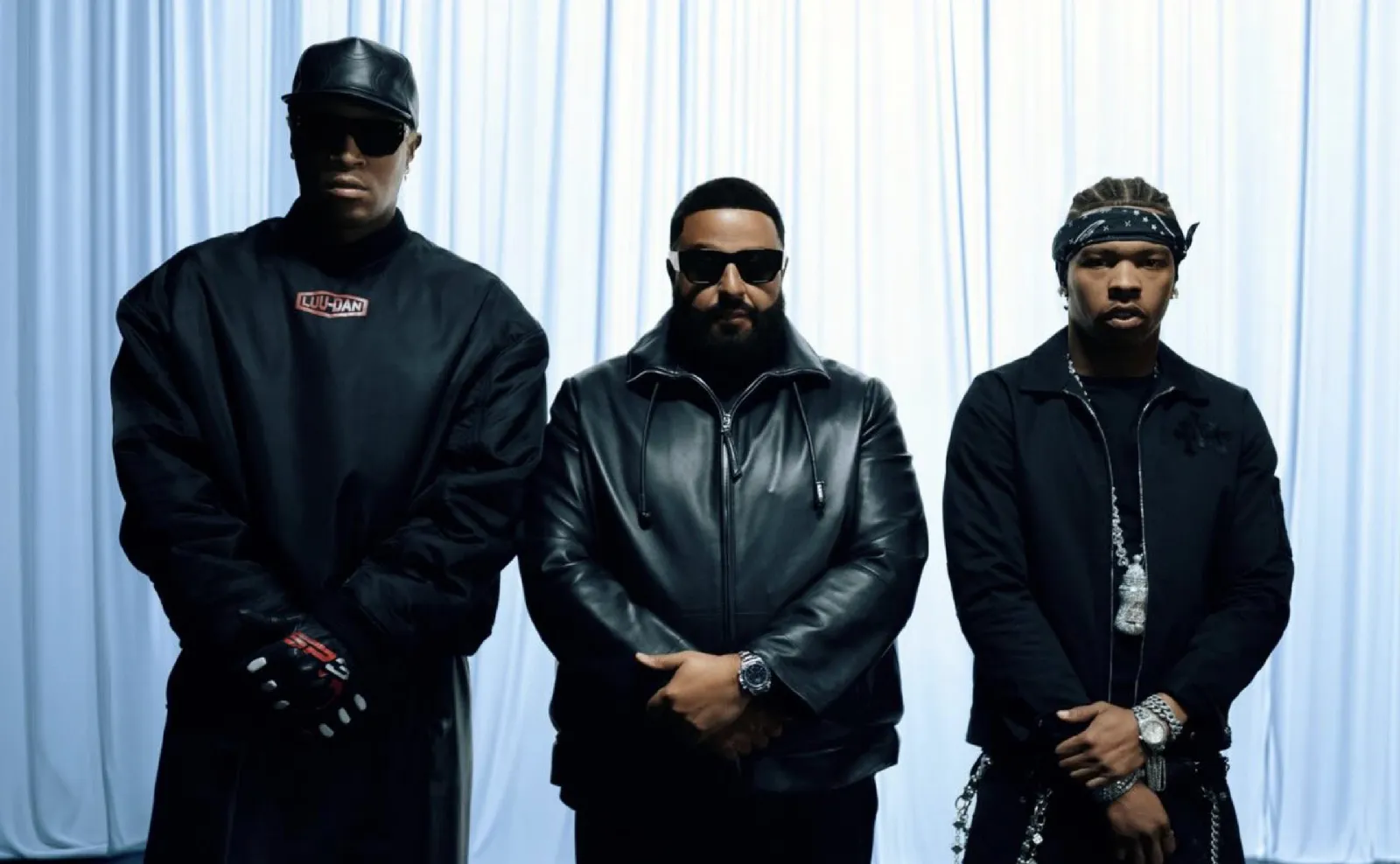 Future, DJ Khaled, and Lil Baby wearing black in a promotional still for their new single “One Of Them”.
