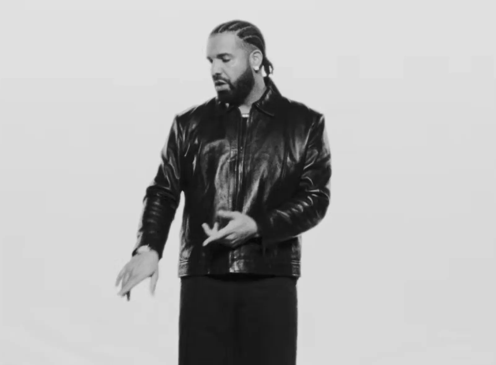 Drake performing in the music video for “National Treasures” from his album Iceman.