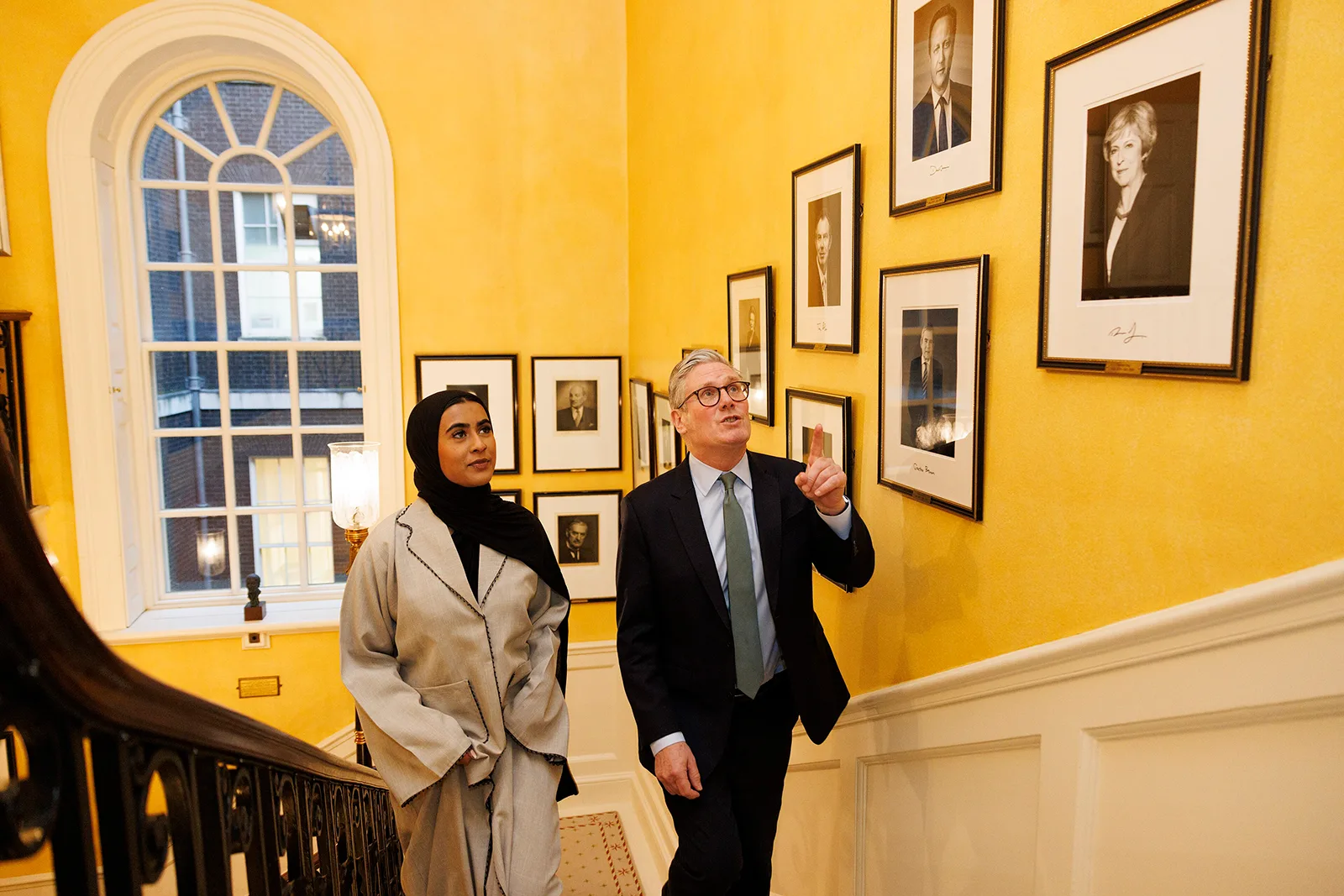 Prime Minister Keir Starmer arrives at a Downing Street Iftar reception with Suraya Miah, highlighting British Muslim representation and participation in public life