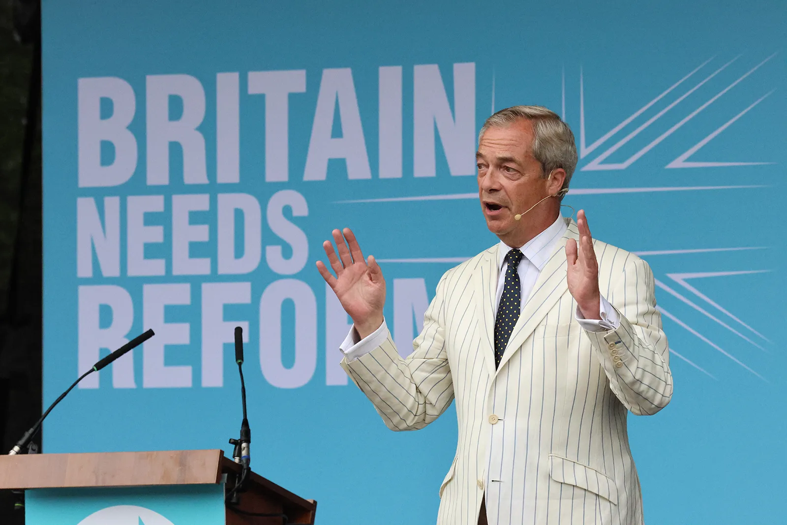 Nigel Farage addressing a Reform UK rally at Trago Mills in Devon during the 2024 UK general election campaign.