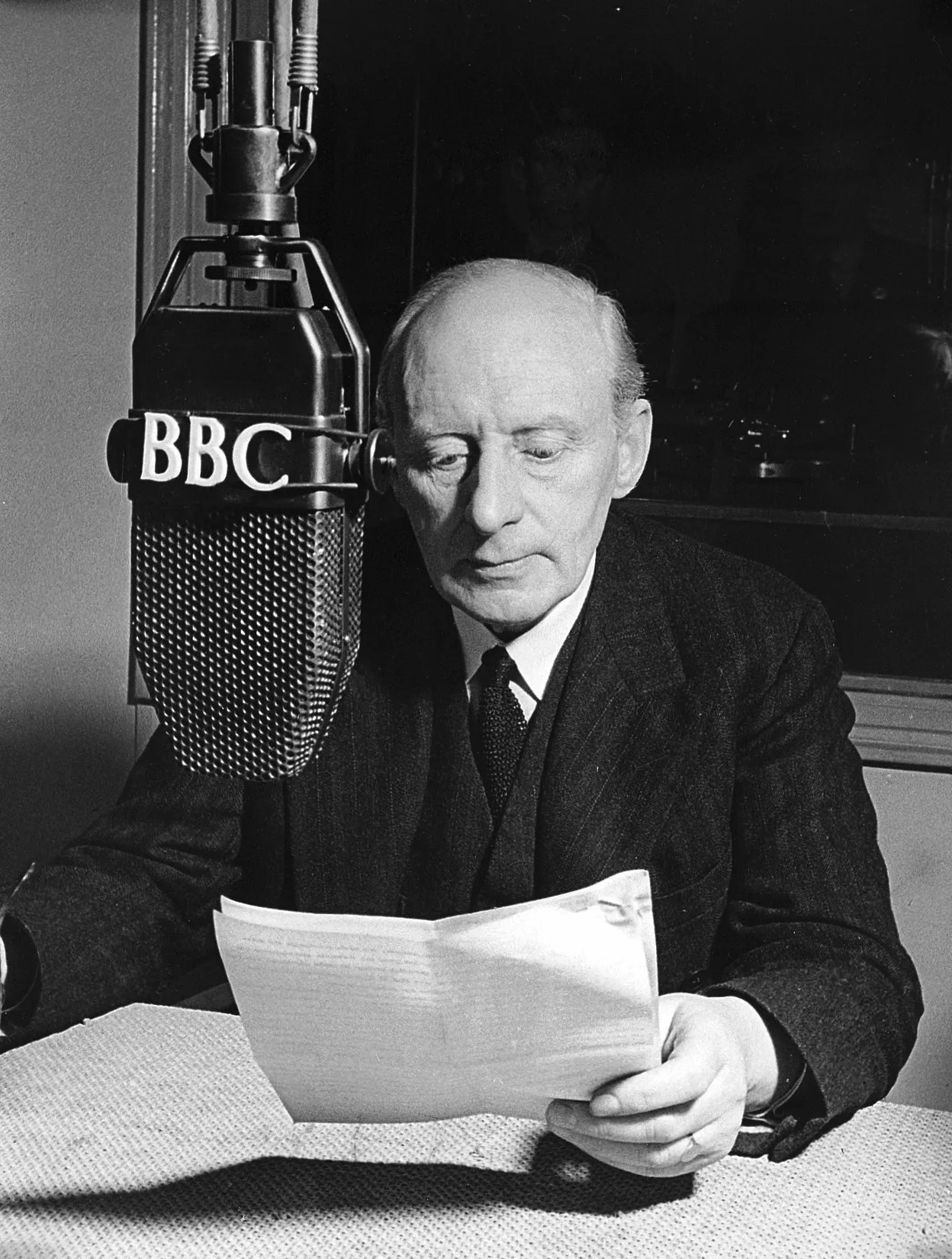 Charles Wilson giving a BBC radio broadcast.